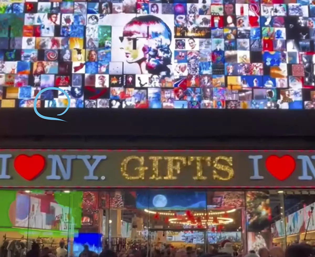 Composición artística realizada con varios trabajos mostrada en una pantalla gigante en Time Square